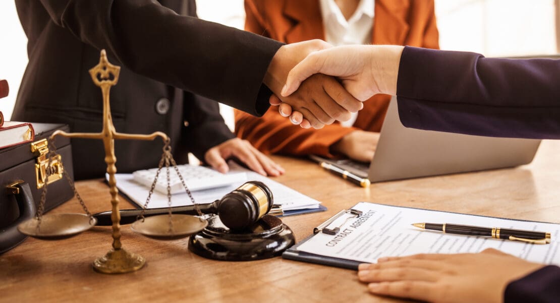 Shaking hands, Lawyers offer legal guidance