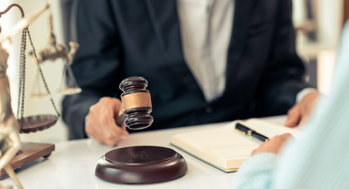 personal injury lawyer with client in office