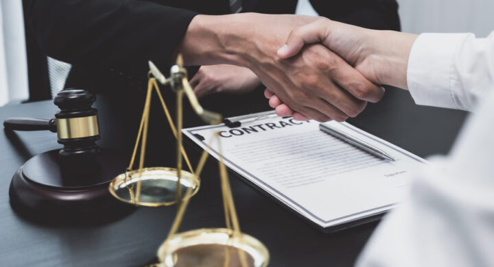 lawyer and client shaking hands