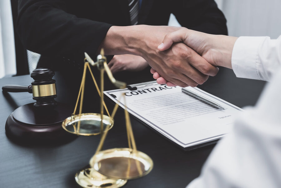 lawyer and client shaking hands
