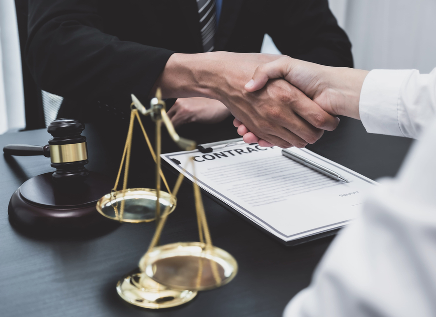 lawyer and client shaking hands